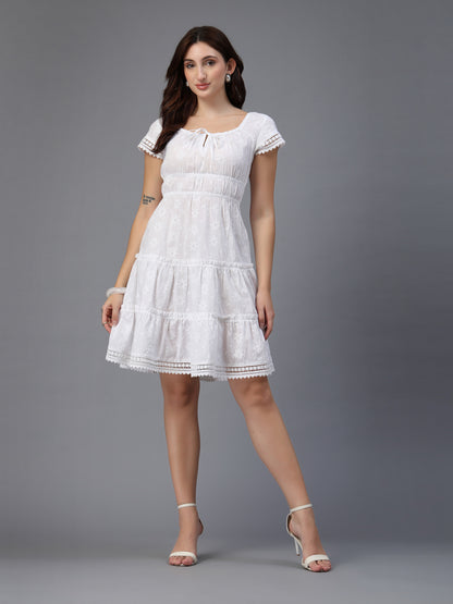 White dress  along with decorative trims-JEFF COOPER