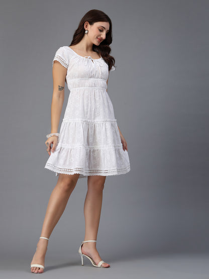 White dress  along with decorative trims-JEFF COOPER