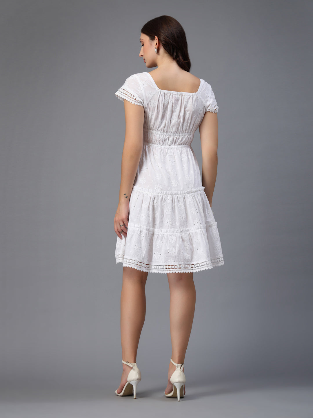 White dress  along with decorative trims-JEFF COOPER